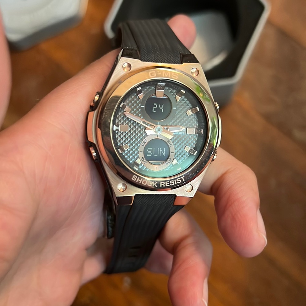 Gold and black baby g shock g-ms